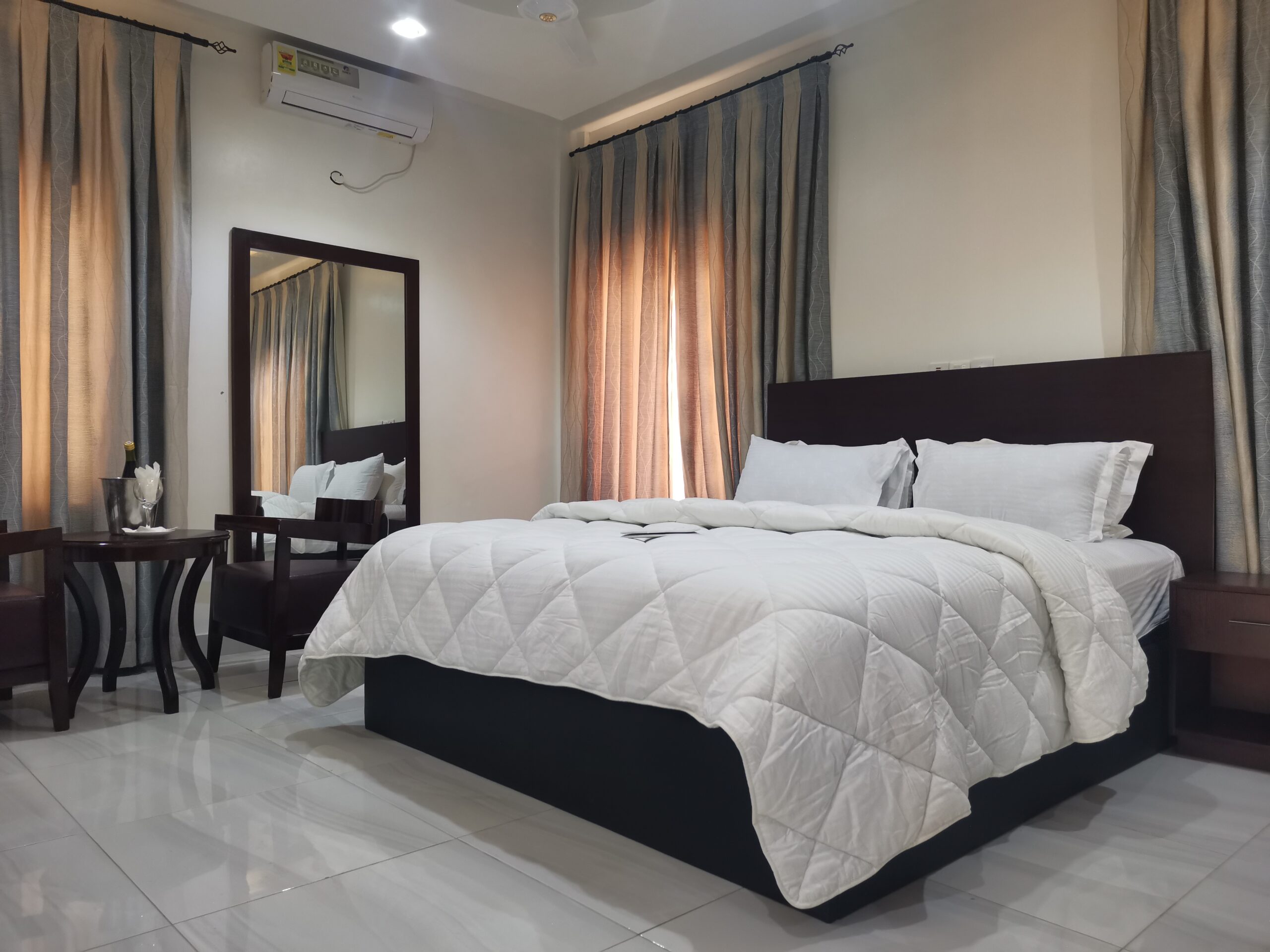 Deluxe Rooms at Villa Kam Hotel, Techiman